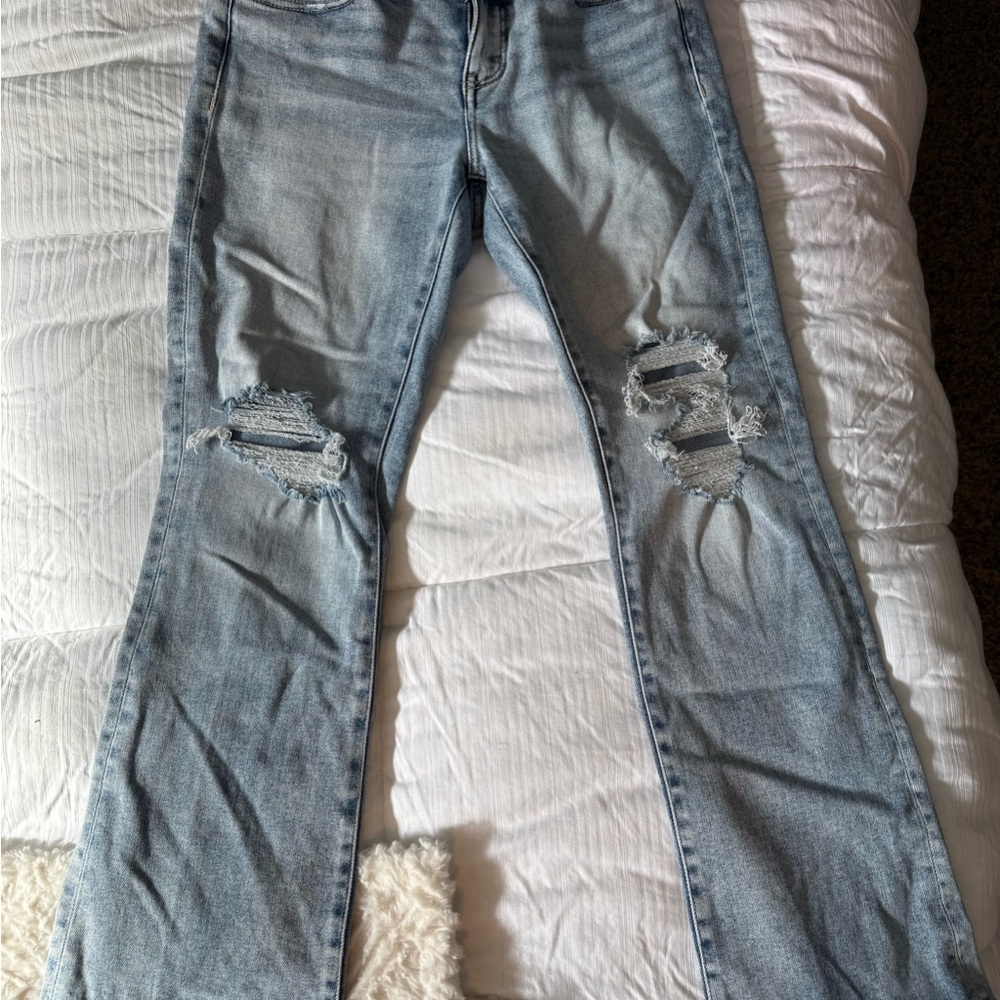 Buckle Blue Boot Cut Jeans with Distressed Details